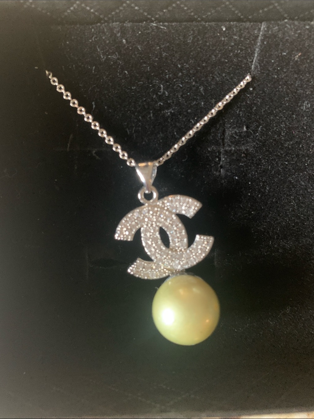 Avocado south sea pearl necklace with Chanel like logo/signity diamonds